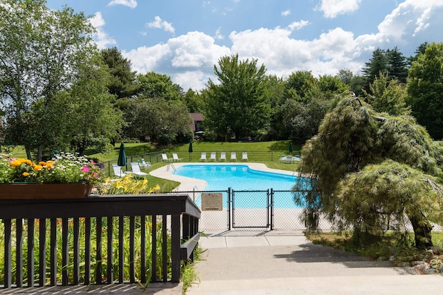 210 Field Rd Unit 44, Stowe, VT 05672 - community pool with a gate and view of scattered trees