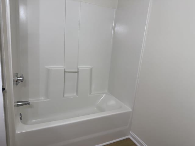 106 Karatzas Ave, Manchester, NH 03104 - full bath with tub / shower combination and baseboards