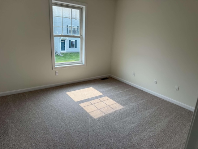 106 Karatzas Ave, Manchester, NH 03104 - unfurnished room with plenty of natural light, carpet floors, and baseboards