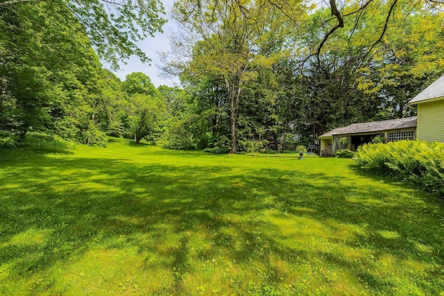 4 Quechee Rd, Hartland, VT 05048 - view of grassy yard featuring a view of trees