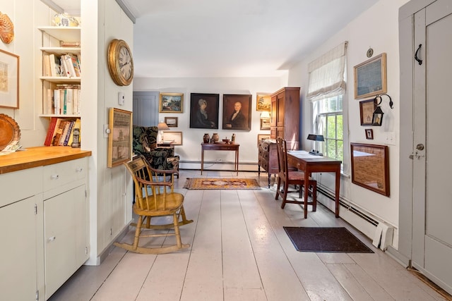 4 Quechee Rd, Hartland, VT 05048 - sitting room featuring a baseboard heating unit and built in shelves