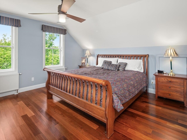 565 W Shore Rd, South Hero, VT 05486 - bedroom with radiator, wood finished floors, vaulted ceiling, baseboards, and a ceiling fan