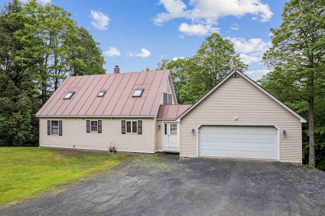 530 W Rd, Barnard, VT 05031 - cape cod-style house with a chimney, driveway, a garage, and a front yard