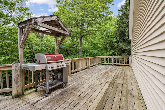 530 W Rd, Barnard, VT 05031 - wooden terrace with area for grilling and view of scattered trees