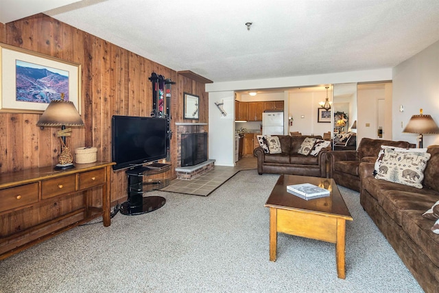 133 E Mountain Rd Unit 3D13, Killington, VT 05751 - carpeted living room featuring wood walls
