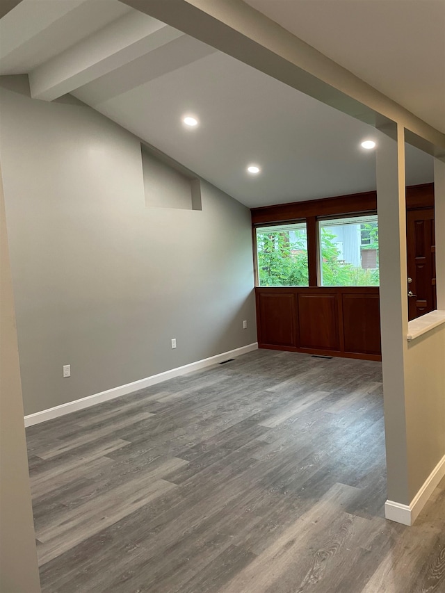 26 W Webster St, Manchester, NH 03104 - spare room with wood finished floors, baseboards, recessed lighting, and lofted ceiling