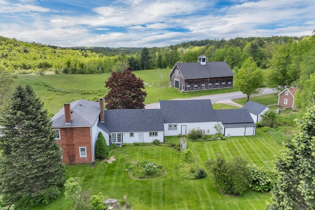 1519 New Boston Rd, Francestown, NH 03043 - aerial view of property and surrounding area featuring a heavily wooded area