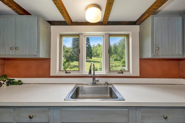 1519 New Boston Rd, Francestown, NH 03043 - kitchen featuring gray cabinets, a sink, light countertops, and beamed ceiling