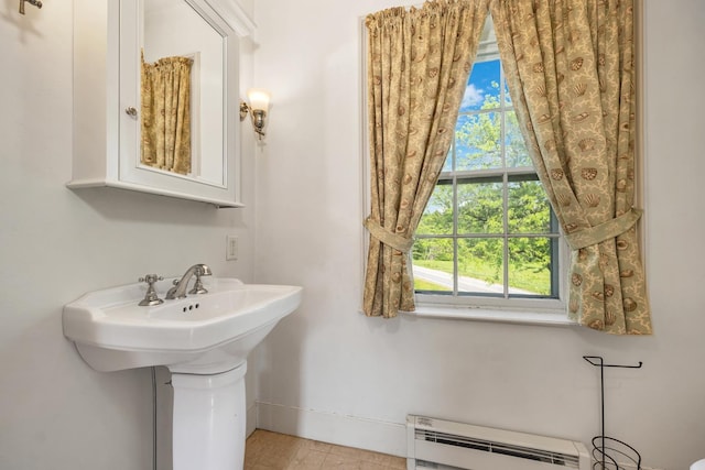 1519 New Boston Rd, Francestown, NH 03043 - bathroom with a baseboard radiator and baseboards