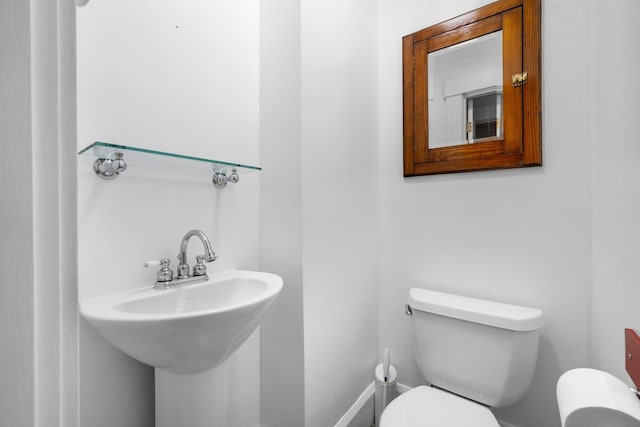 647 Canal St, Manchester, NH 03101 - bathroom featuring toilet and a sink