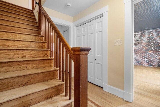 647 Canal St, Manchester, NH 03101 - stairway featuring wood finished floors and baseboards