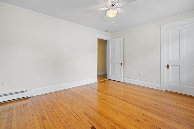 647 Canal St, Manchester, NH 03101 - spare room with baseboards, ceiling fan, ornamental molding, light wood finished floors, and baseboard heating