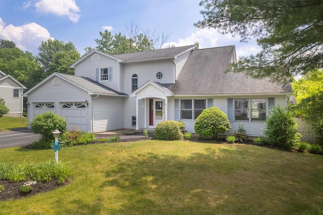 6 Moonbrook Dr, Rutland City, VT 05701 - traditional home featuring roof with shingles, a garage, and driveway