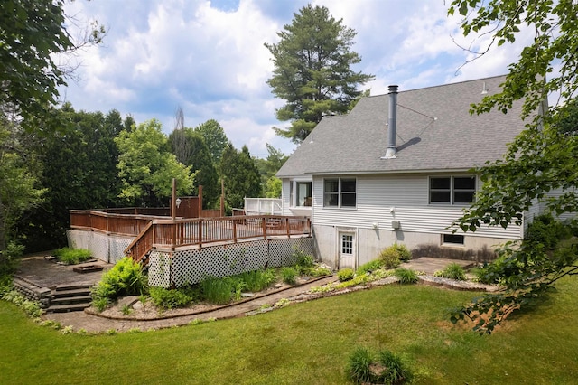 6 Moonbrook Dr, Rutland City, VT 05701 - back of house featuring a yard, a deck, roof with shingles, and a patio area