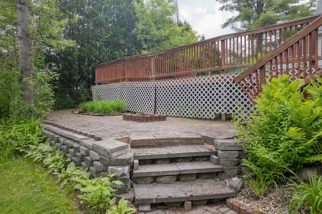 6 Moonbrook Dr, Rutland City, VT 05701 - deck with a patio area and a fire pit