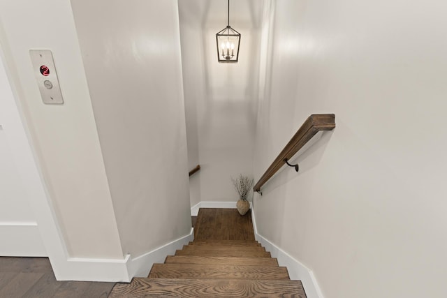 25 Little Bay Dr, Dover, NH 03820 - staircase with baseboards, wood finished floors, and a chandelier