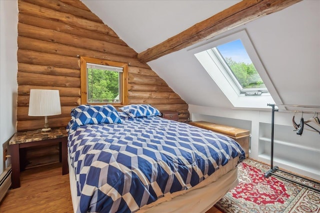 458 Woodcock Rd, Plainfield, VT 05667 - bedroom featuring rustic walls, a skylight, wood finished floors, vaulted ceiling, and a baseboard radiator