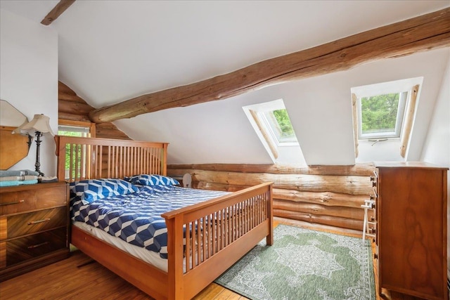 458 Woodcock Rd, Plainfield, VT 05667 - bedroom featuring log walls, a skylight, and wood finished floors