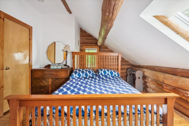458 Woodcock Rd, Plainfield, VT 05667 - bedroom featuring rustic walls, vaulted ceiling, multiple windows, and wood finished floors