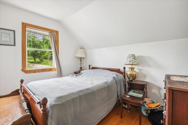 458 Woodcock Rd, Plainfield, VT 05667 - bedroom featuring vaulted ceiling and hardwood / wood-style flooring
