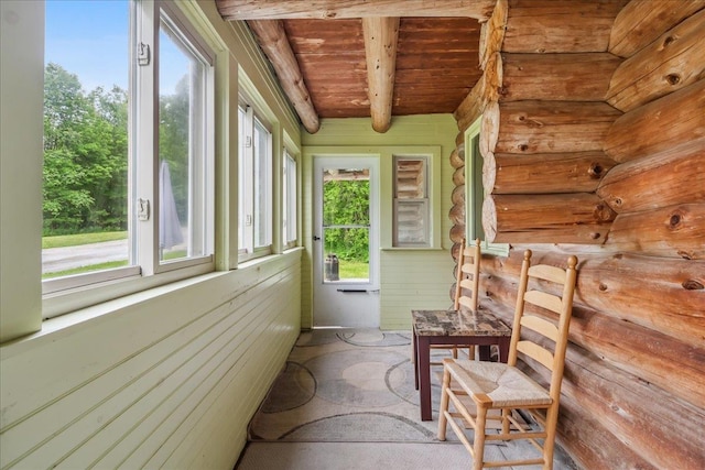458 Woodcock Rd, Plainfield, VT 05667 - sunroom with wooden ceiling with exposed beams and rustic walls