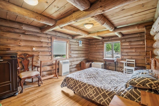 458 Woodcock Rd, Plainfield, VT 05667 - bedroom featuring wood ceiling with exposed beams and light wood-type flooring