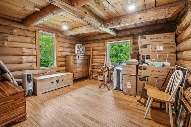 458 Woodcock Rd, Plainfield, VT 05667 - office space with wood ceiling with exposed beams, hardwood / wood-style flooring, healthy amount of natural light, and rustic walls