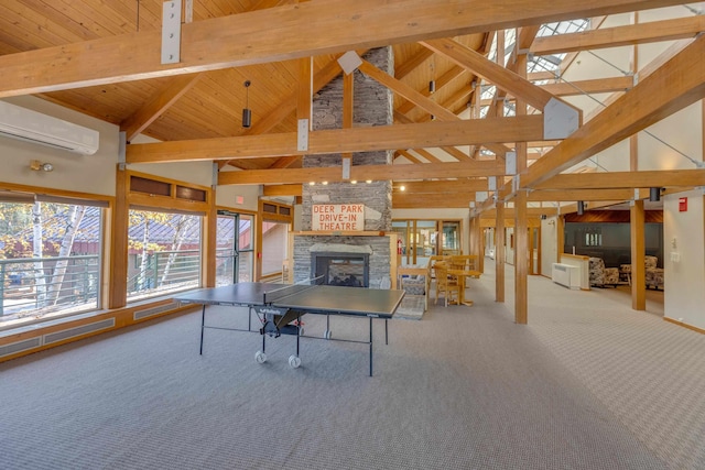 156 Deer Park Dr Unit 127D, Woodstock, NH 03262 - recreation room with an AC wall unit, a stone fireplace, carpet floors, high vaulted ceiling, and wood ceiling with exposed beams