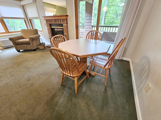 156 Deer Park Dr Unit 127D, Woodstock, NH 03262 - carpeted dining area featuring baseboards and a fireplace