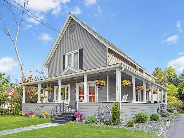 128 Gale St, Canaan, VT 05903 - farmhouse-style home featuring a porch and a front yard