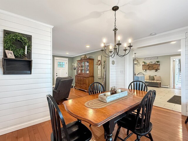 128 Gale St, Canaan, VT 05903 - dining area with crown molding, a chandelier, light wood-style flooring, a baseboard heating unit, and recessed lighting