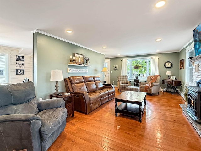 128 Gale St, Canaan, VT 05903 - living area with ornamental molding, light wood-style flooring, recessed lighting, and a wood stove