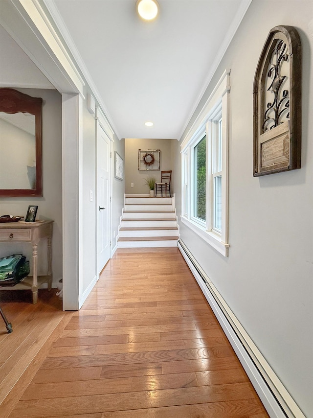 128 Gale St, Canaan, VT 05903 - corridor with a baseboard radiator, light wood-style flooring, stairway, and recessed lighting