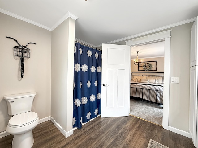 128 Gale St, Canaan, VT 05903 - bathroom featuring wood finished floors, crown molding, baseboards, a chandelier, and toilet