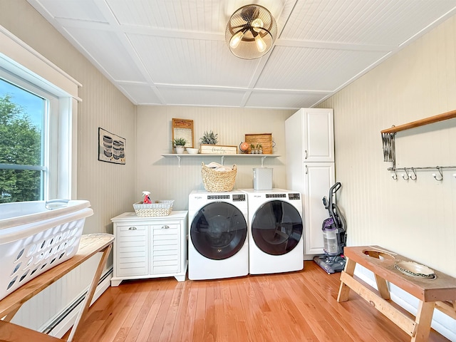 128 Gale St, Canaan, VT 05903 - washroom featuring cabinet space, separate washer and dryer, and light wood-style flooring