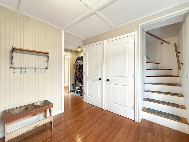 128 Gale St, Canaan, VT 05903 - hallway with wood finished floors and stairs