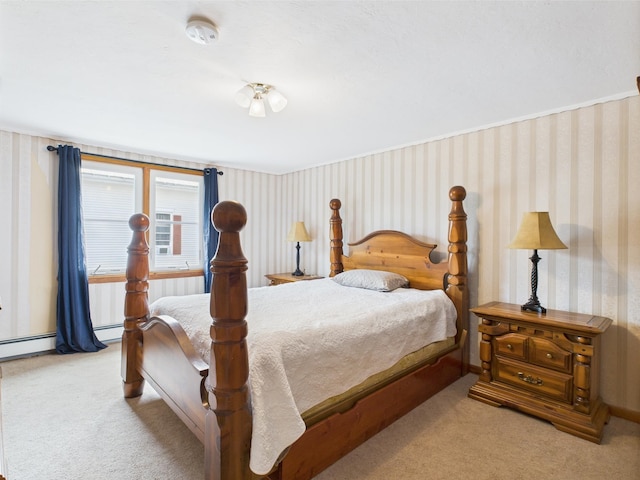 128 Gale St, Canaan, VT 05903 - carpeted bedroom with wallpapered walls and baseboard heating