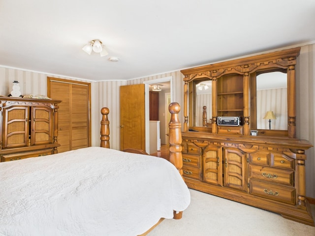 128 Gale St, Canaan, VT 05903 - bedroom with a closet, carpet, wallpapered walls, and crown molding