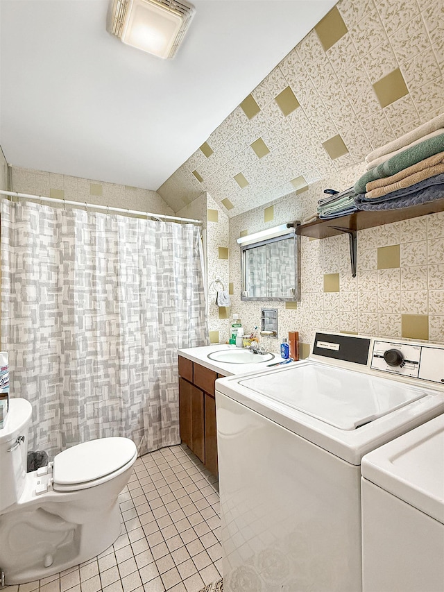 128 Gale St, Canaan, VT 05903 - laundry room featuring washing machine and dryer and light tile patterned floors