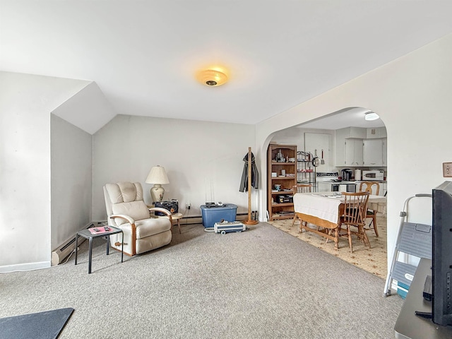 128 Gale St, Canaan, VT 05903 - living area with arched walkways, carpet, and lofted ceiling