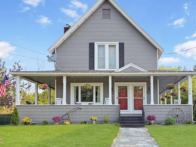 128 Gale St, Canaan, VT 05903 - farmhouse with covered porch, a chimney, and a front yard