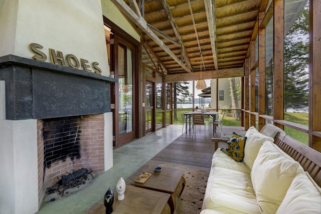 518 Shaker Blvd, Enfield, NH 03748 - sunroom with an outdoor living space with a fireplace