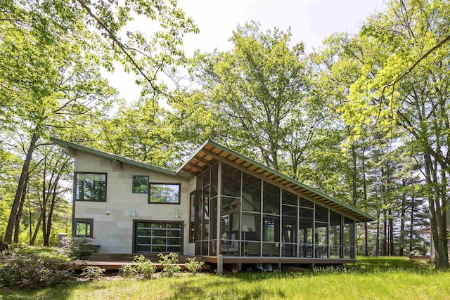 518 Shaker Blvd, Enfield, NH 03748 - back of house with a sunroom