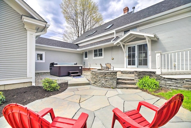 83 Maple St, Morristown, VT 05661 - view of patio with a hot tub