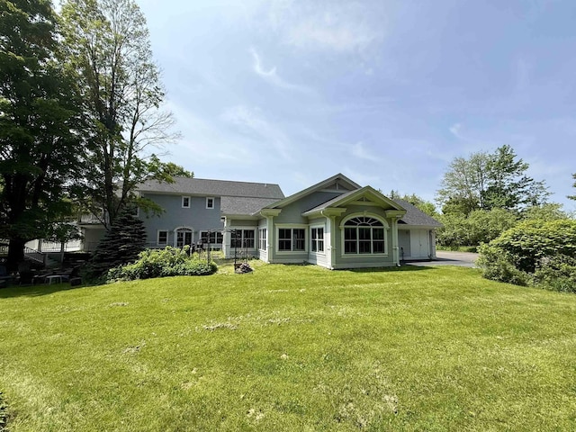 83 Maple St, Morristown, VT 05661 - rear view of property with a yard