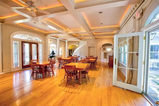 83 Maple St, Morristown, VT 05661 - dining area with coffered ceiling, beamed ceiling, light wood-style flooring, french doors, and a ceiling fan