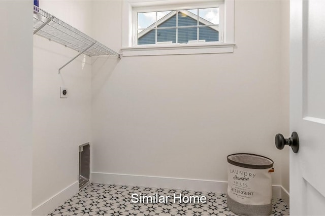 LOT47 Baker Rd Unit 47, Wells, ME 04090 - laundry area featuring baseboards and hookup for an electric dryer