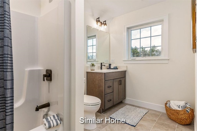 LOT47 Baker Rd Unit 47, Wells, ME 04090 - full bath featuring plenty of natural light, vanity, tile patterned flooring, and toilet
