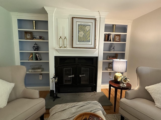 11 Pimlico Ct, Bedford, NH 03110 - living room with wood finished floors and built in shelves