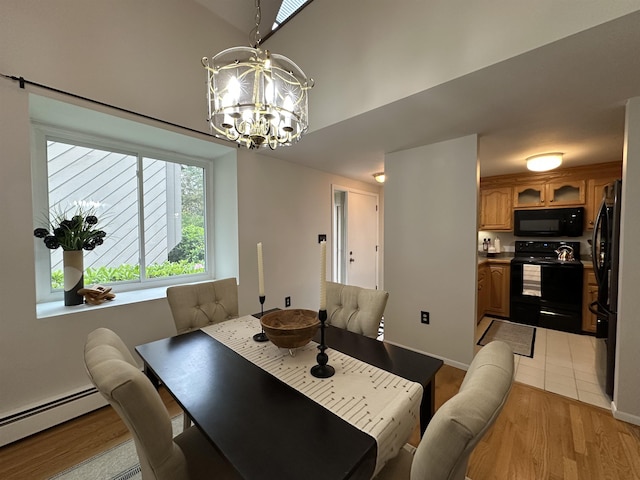 11 Pimlico Ct, Bedford, NH 03110 - dining area with a chandelier, baseboard heating, light wood-style flooring, and a towering ceiling